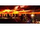 A group of motorbikers enjoying a ride on the beach at sunset at 6415 Midnight Pass Rd # 904, Sarasota, FL 34242