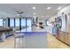 Modern kitchen with granite countertops and stainless steel appliances, offering an open layout and abundant natural light at 6415 Midnight Pass Rd # 904, Sarasota, FL 34242