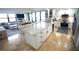 Modern kitchen with granite countertops and stainless steel appliances, offering an open layout and abundant natural light at 6415 Midnight Pass Rd # 904, Sarasota, FL 34242