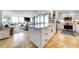 Modern kitchen with granite countertops, stainless steel appliances, and an island with seating at 6415 Midnight Pass Rd # 904, Sarasota, FL 34242
