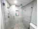 Close up of the large walk-in shower with dual shower heads and tiled niche at 6415 Midnight Pass Rd # 904, Sarasota, FL 34242