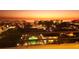 Beautiful sunset view overlooking a pool and the coastline at 6415 Midnight Pass Rd # 904, Sarasota, FL 34242
