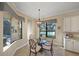 Cozy breakfast nook with a view of the lake at 7108 Callander Cv, Lakewood Ranch, FL 34202