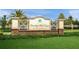 Elegant stone community sign reading 'Country Club East' welcomes residents with lush landscaping at 7108 Callander Cv, Lakewood Ranch, FL 34202