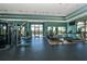 Spacious gym area with exercise equipment and natural light at 7108 Callander Cv, Lakewood Ranch, FL 34202