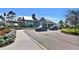 Upscale clubhouse with elegant architecture, manicured landscaping, and convenient parking adds to the community's appeal at 8192 Sternway Rd, Sarasota, FL 34240