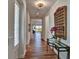 Hallway featuring luxury vinyl plank flooring and decor at 8192 Sternway Rd, Sarasota, FL 34240