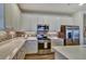 Modern kitchen featuring white cabinets, stainless steel appliances, and stylish backsplash for a contemporary feel at 8192 Sternway Rd, Sarasota, FL 34240