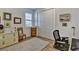 Cozy home office featuring a large closet, desk, and natural light at 8192 Sternway Rd, Sarasota, FL 34240