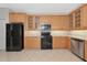 Bright kitchen features lots of wood cabinets, stainless steel appliances, and a practical layout at 8310 Tartan Fields Cir, Lakewood Ranch, FL 34202