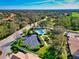 Community pool area with plentiful palm trees offering shade and parking at 8310 Tartan Fields Cir, Lakewood Ranch, FL 34202