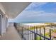 This amazing balcony overlooks the sandy beach and blue ocean waters at 101 Benjamin Franklin Dr # 71, Sarasota, FL 34236