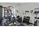 A community gym with exercise equipment and weights at 101 Benjamin Franklin Dr # 71, Sarasota, FL 34236