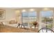 Living room with a view of the beach at 101 Benjamin Franklin Dr # 71, Sarasota, FL 34236