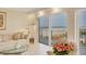 Living room with balcony overlooking the beach at 101 Benjamin Franklin Dr # 71, Sarasota, FL 34236