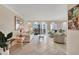 Bright living area with comfortable seating and balcony access offers a relaxing and inviting atmosphere at 101 Benjamin Franklin Dr # 71, Sarasota, FL 34236