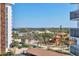Neighborhood view of houses and palm trees at 101 Benjamin Franklin Dr # 71, Sarasota, FL 34236