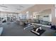 Brightly lit gym offering cardio equipment, weights, a full mirror, and a juice bar at 10600 Lemon Creek Loop # 102, Englewood, FL 34224
