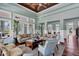 Spacious living area with hardwood floors, comfortable sofas, and lots of natural light at 10600 Lemon Creek Loop # 102, Englewood, FL 34224
