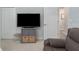 Relaxing bedroom featuring a TV, and a comfortable recliner for lounging at 10919 Blue Magnolia Ln, Parrish, FL 34219