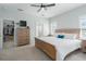 Bright main bedroom features a walk-in closet and ensuite bathroom at 10919 Blue Magnolia Ln, Parrish, FL 34219