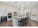 Modern kitchen features stainless steel appliances, granite countertops, and ample cabinet space at 12423 Blue Hill Trl, Lakewood Ranch, FL 34211