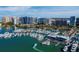 Expansive aerial shot featuring a yacht-filled marina and a skyline filled with modern buildings at 1255 N Gulfstream Ave # 407, Sarasota, FL 34236