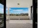 Expansive tiled balcony with a picturesque waterfront view at 1255 N Gulfstream Ave # 407, Sarasota, FL 34236
