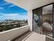 Nice balcony with great views of the water, city skyline, and a glimpse into the bedroom at 1255 N Gulfstream Ave # 407, Sarasota, FL 34236