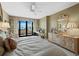 Bedroom with a large window overlooking the waterfront at 1255 N Gulfstream Ave # 407, Sarasota, FL 34236