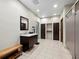 Bright, clean changing room with vanity, lockers, and bench seating for added convenience at 1255 N Gulfstream Ave # 407, Sarasota, FL 34236
