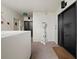 Bright hallway features a decorative statue and a clear exit sign for added safety and refined decor at 1255 N Gulfstream Ave # 407, Sarasota, FL 34236