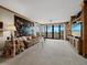 Bright living room with waterfront views and ample space at 1255 N Gulfstream Ave # 407, Sarasota, FL 34236