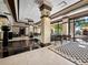 Elegant lobby featuring marble floors, stylish seating, and large windows with natural light at 1255 N Gulfstream Ave # 407, Sarasota, FL 34236