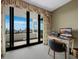 Office nook with a desk and water views from the window at 1255 N Gulfstream Ave # 407, Sarasota, FL 34236