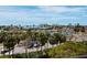 Expansive view of the water, city skyline, and lush palm trees at 1255 N Gulfstream Ave # 407, Sarasota, FL 34236