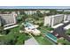 A close-up aerial view of the pool and the clubhouse, highlighting the recreational amenities at 3860 Ironwood Ln # 503G, Bradenton, FL 34209