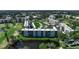A beautiful aerial view of a condo community and the surrounding landscaping and golf course at 3860 Ironwood Ln # 503G, Bradenton, FL 34209