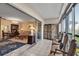 Enclosed lanai featuring tile flooring, sliding doors, and comfortable seating at 3860 Ironwood Ln # 503G, Bradenton, FL 34209
