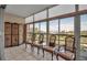 Bright balcony with floor-to-ceiling windows overlooking a scenic view at 3860 Ironwood Ln # 503G, Bradenton, FL 34209