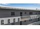 Exterior view of the building showing balconies and architectural details at 3860 Ironwood Ln # 503G, Bradenton, FL 34209