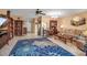 Spacious living room featuring tile flooring, a ceiling fan, and ample seating at 3860 Ironwood Ln # 503G, Bradenton, FL 34209