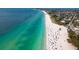 Stunning aerial view of the beach with clear blue water and white sand in Anna Maria Island at 4440 Fairways Blvd # 407, Bradenton, FL 34209