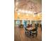 Community room with tables, chairs, and an open floor plan, ideal for gatherings and events at 4440 Fairways Blvd # 407, Bradenton, FL 34209