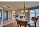 Bright dining area with view into kitchen area, with comfortable seating and natural light at 4440 Fairways Blvd # 407, Bradenton, FL 34209