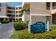 Exterior view of a building at Fairways Two with lush landscaping and signage at 4440 Fairways Blvd # 407, Bradenton, FL 34209
