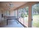 Game room with ping pong table and natural light, perfect for entertainment and recreation at 4440 Fairways Blvd # 407, Bradenton, FL 34209