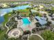 An inviting community boasts a pool, playground, lake, tennis court, and clubhouse for endless entertainment at 4516 Renwick Dr, Parrish, FL 34219