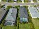 Birds eye view of homes with screened-in pools, showcasing backyard privacy and neighborhood layout at 4516 Renwick Dr, Parrish, FL 34219