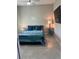 Tastefully decorated bedroom offering a cozy atmosphere with a bed, ceiling fan and mounted TV at 4516 Renwick Dr, Parrish, FL 34219